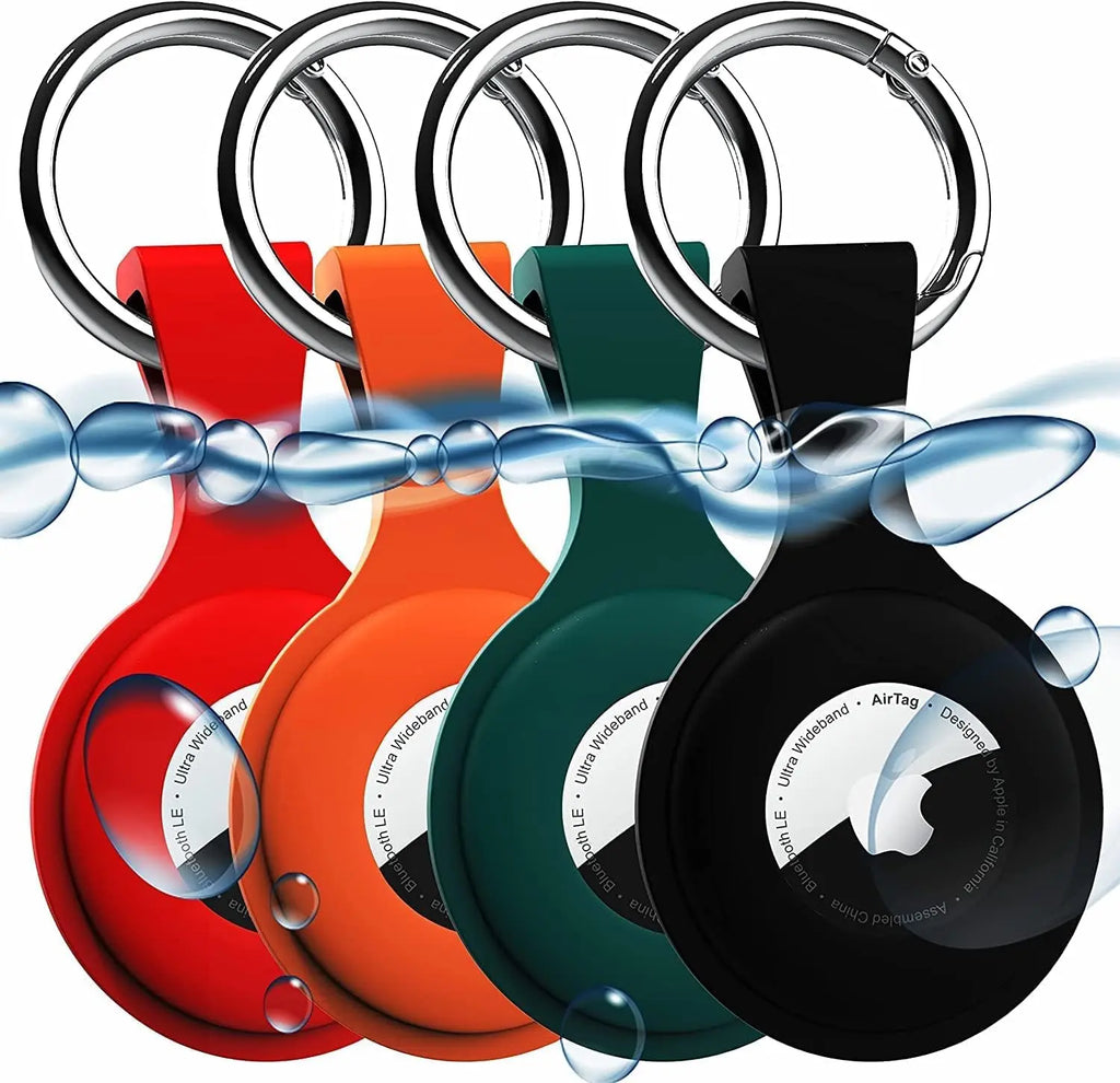4 pack AirTag silicone keychain holders in assorted colors laid flat