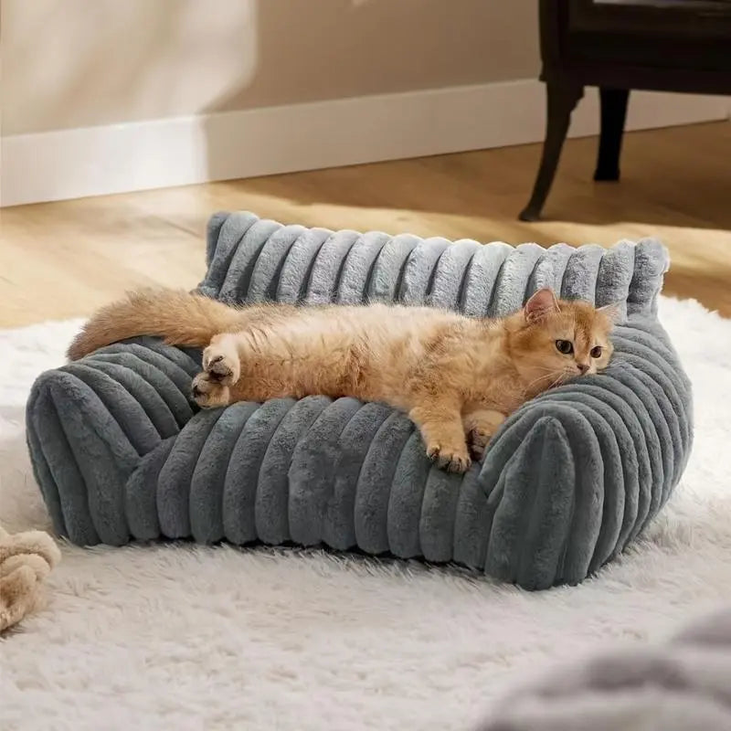Cat sofa pet bed side view showing bolstered armrests and plush corduroy fabric